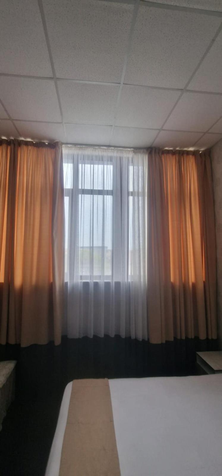 Tarlan Hotel Актау Экстерьер фото